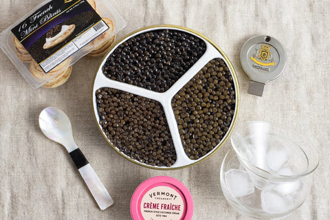Signature Trio: The Full Service Set with blinis, creme fraiche mini tub, mother of pearl spoon, tin opener, and martini style caviar server